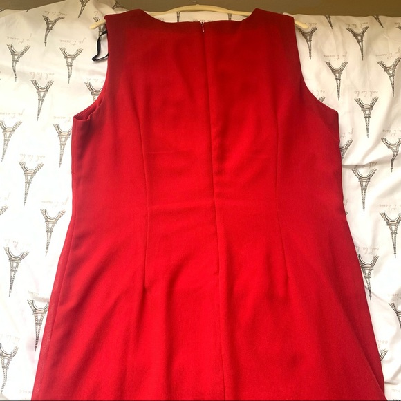 Sleeveless Dress with Embellished Wrap Hem Detail - Picture 10 of 10